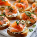 Smoked Salmon on Crostini with herb cream cheese